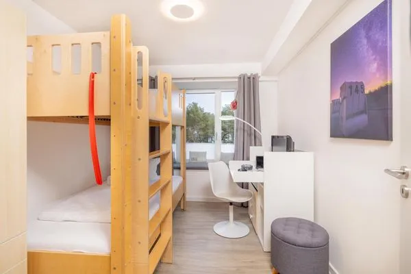 Schlafzimmer 2: Etagenbett (90 x200), 1 Schreibtisch, Spielekonsole  FeWo Dünenblick in PRORA - 5.34