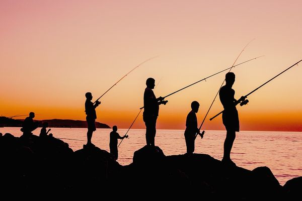 Angler am Strand