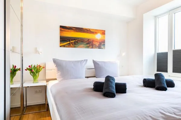 Schlafzimmer: Doppelbett (180x200)  FeWo Dünenheide 2.1 in PRORA - 7.21