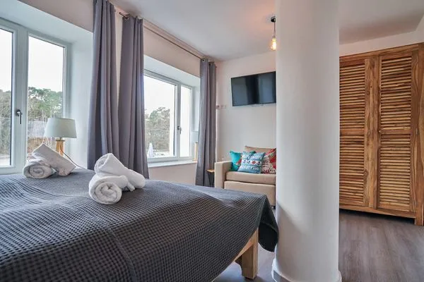 Schlafzimmer 2: Doppelbett (180x200), Schlafsessel, TV  FeWo Hühnergott in PRORA - 5.07