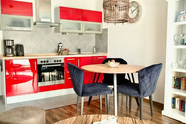 offene Küchenzeile mit Essbereich  Villa Carpe Diem Wohnung 6