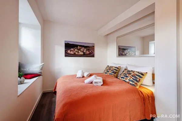 Schlafzimmer 2: Doppelbett (180x200), TV  FeWo Strandidyll in PRORA - 9.31