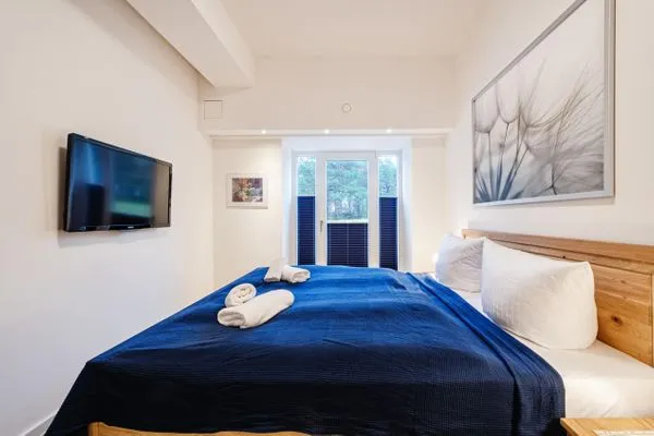 Schlafzimmer 1, Doppelbett (180x200), TV  FeWo Ostseebrise in PRORA - 5.03