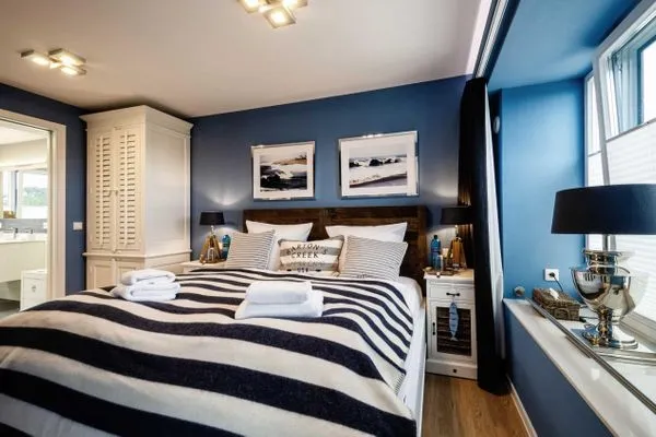 Schlafzimmer 1: Doppelbett (180 x 200), TV, Insektenschutz  FeWo Sealion Dachterrasse in PRORA - 5.51