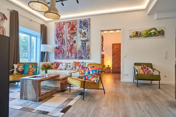 Wohn- /Essbereich: Sofa, Sitzbereich, Essbereich, TV  FeWo Seemannsgarn in PRORA - 7.04