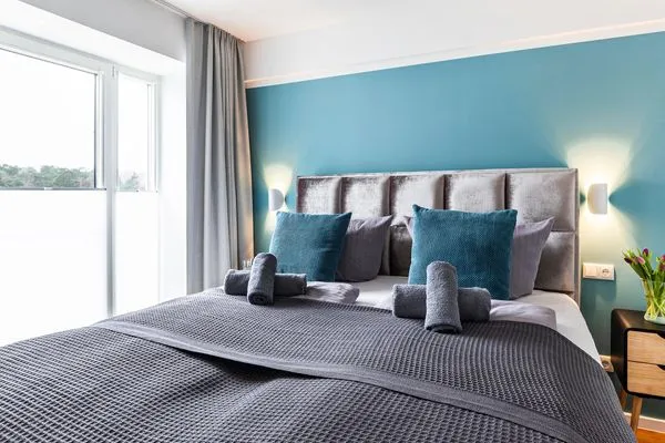 Schlafzimmer 1: Doppelbett (180x200), TV  FeWo Baltic Sunset in PRORA - 3.34