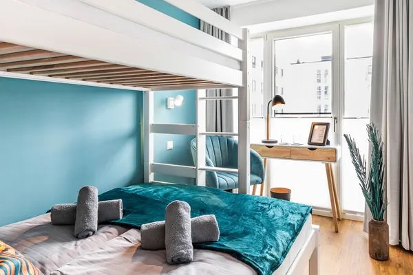 Schlafzimmer 2: Etagenbett (140x200) / (90x200), TV  FeWo Baltic Sunset in PRORA - 3.34