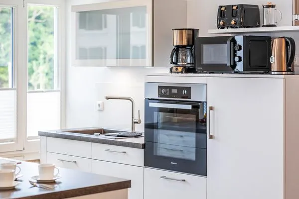 Küche: offene Küche mit Essbereich  FeWo Seeadler in PRORA - 2.11