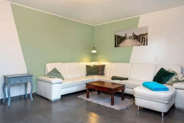 Wohnbereich mit Sofa  Haus Zeitlos