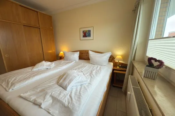 Schlafzimmer Ferienwohnung im Haus Nordland App 24