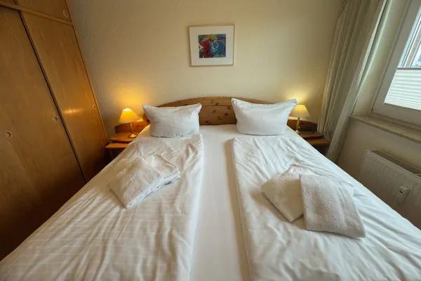 Schlafzimmer Ferienwohnung im Haus Nordland App 24