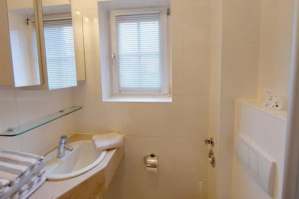 Badezimmer in der Ferienwohnung Auszeit am Meer in Wittdün auf Amrum Haus *Südspitze 17* Ferienwohnung *Auszeit am Meer*