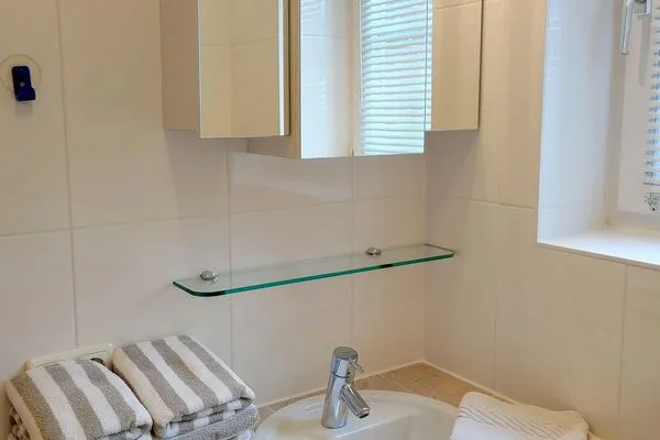 Badezimmer in der Ferienwohnung Auszeit am Meer in Wittdün auf Amrum Haus *Südspitze 17* Ferienwohnung *Auszeit am Meer*