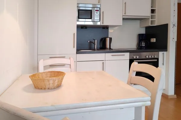 offene Küche in der Ferienwohnung Auszeit am Meer in Wittdün auf Amrum Haus *Südspitze 17* Ferienwohnung *Auszeit am Meer*