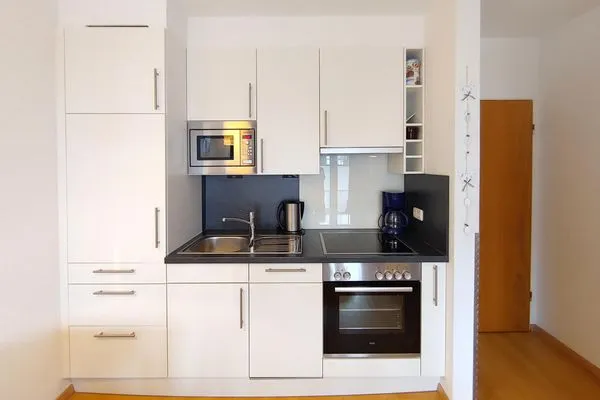 offene Küche in der Ferienwohnung Auszeit am Meer in Wittdün auf Amrum Haus *Südspitze 17* Ferienwohnung *Auszeit am Meer*