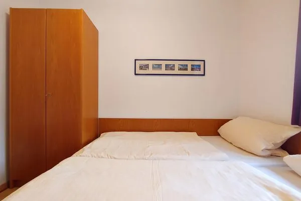 Schlafzimmer in der Ferienwohnung Auszeit am Meer in Wittdün auf Amrum Haus *Südspitze 17* Ferienwohnung *Auszeit am Meer*