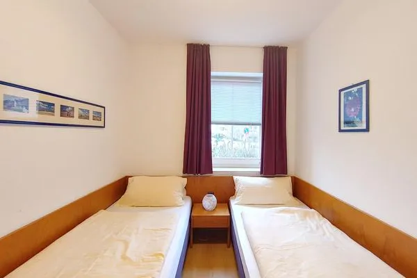 Schlafzimmer in der Ferienwohnung Auszeit am Meer in Wittdün auf Amrum Haus *Südspitze 17* Ferienwohnung *Auszeit am Meer*