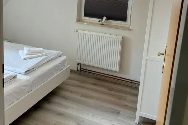 Schlafzimmer mit Doppelbett Am Deich Am Deich Haus 18