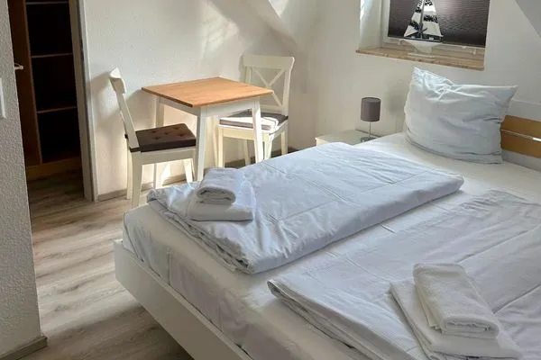 Schlafzimmer mit Doppelbett Am Deich Am Deich Haus 18