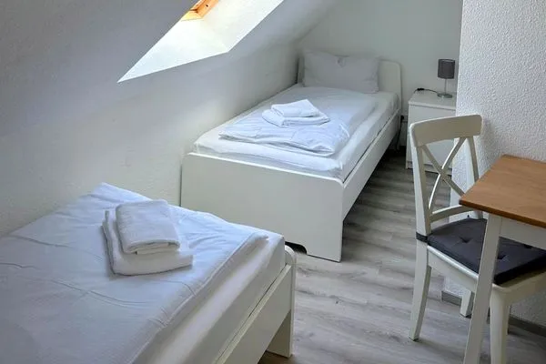 Schlafzimmer mit zwei Einzelbetten Am Deich Am Deich Haus 18