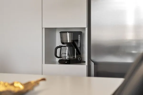 Ferienwohnung Hafenblick Waren (Müritz) – Praktische Kaffeemaschine für den perfekten Start in den Tag  Hafenblick