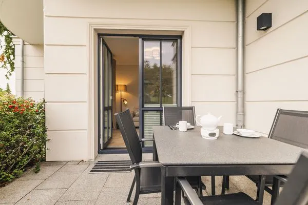 Terrasse mit Blick ins Wohnzimmer Logierhaus Friedrich WE 2 - "Strandrose"