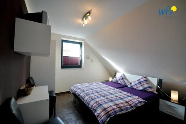 Schlafzimmer Haus Meerjungfrau Ferienwohnung 1