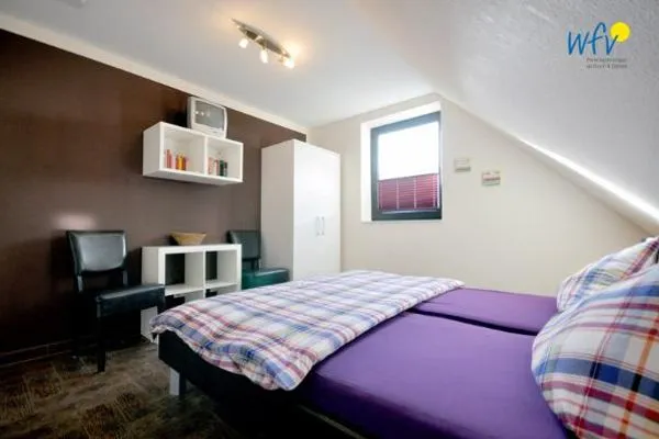 Schlafzimmer Haus Meerjungfrau Ferienwohnung 1