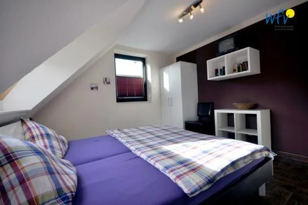 Schlafzimmer Haus Meerjungfrau Ferienwohnung 1