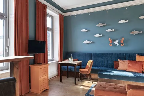 Wohnzimmer Strandvilla Hafenloge - stilvoll wohnen direkt am Niendorfer Hafen