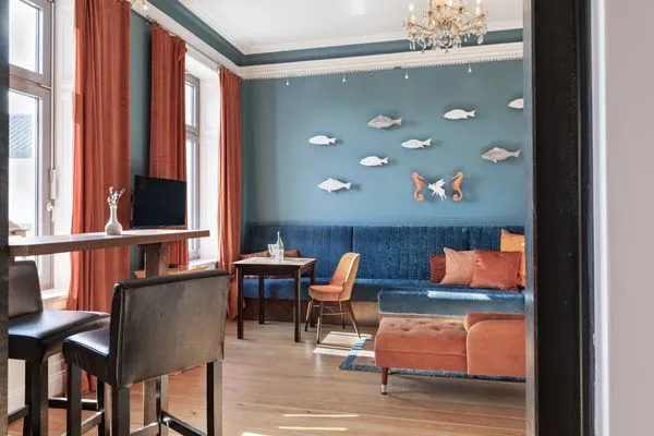 Wohnzimmer Strandvilla Hafenloge - stilvoll wohnen direkt am Niendorfer Hafen