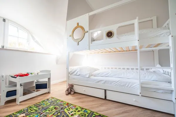 Schlafzimmer  Ferienhaus Haubenlerche 53 - Boddenglück