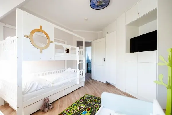 Schlafzimmer  Ferienhaus Haubenlerche 53 - Boddenglück