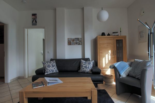 Wohnzimmer mit Schlafsofa