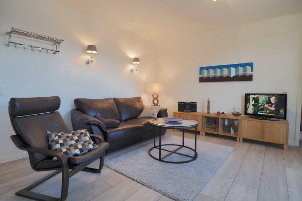 Wohnzimmer mit Schlafsofa für eine zusätzl. Person