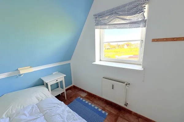 Schlafzimmer  Ferienwohnung Drachen