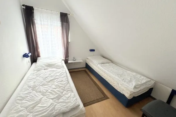 Schlafzimmer  Ferienwohnung Sonnenperle - Wohnung 13