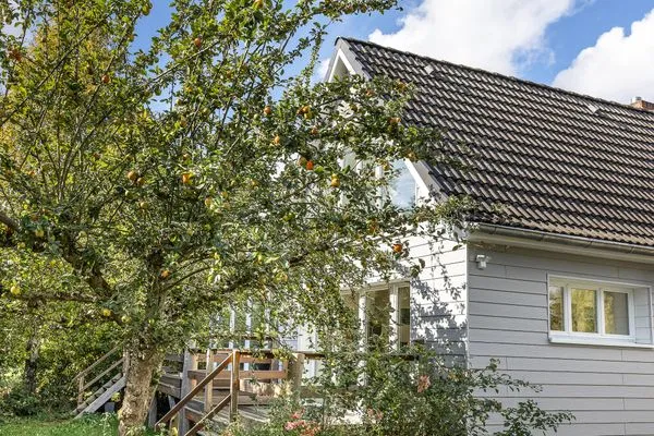Fassade / Eingang Haffperle Küstenperle - zentral in Haffkrug, nur wenige Schritte zum Strand