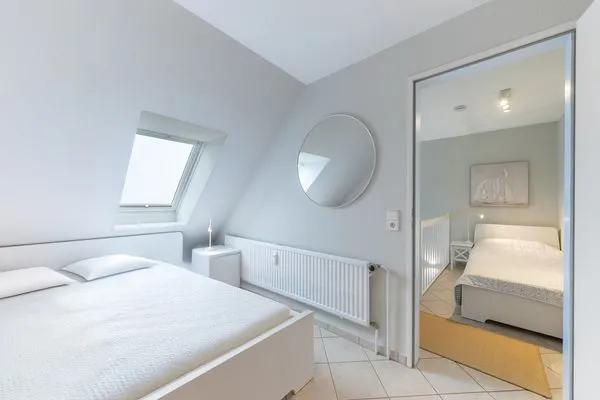 Schlafzimmer  Heimathafen - direkt am Strand mit Sonnenbalkon