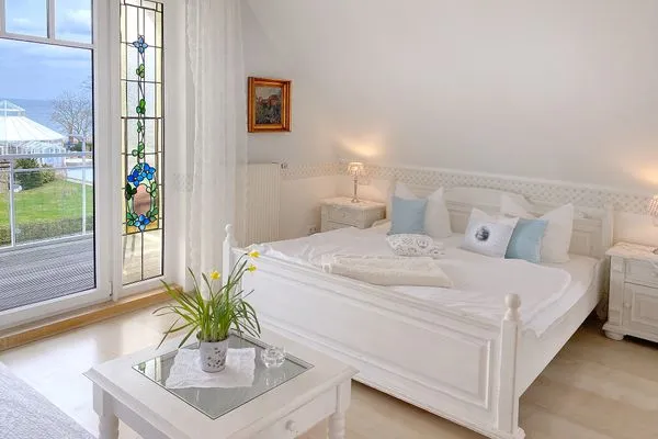 Wohnzimmer  Haus Anholt App. 38 - charmante kleine Suite mit Balkon & Teilmeerblick