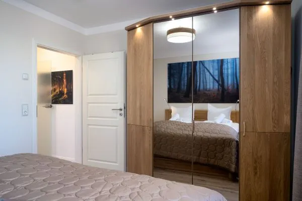 Schlafzimmer  Villa Nause, Ferienwohnung Buchenfreund mit Spa und Freizeit