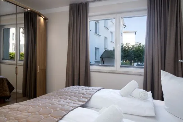 Schlafzimmer  Villa Nause, Ferienwohnung Buchenfreund mit Spa und Freizeit