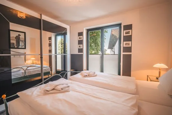 Schlafzimmer  Villa Friede-Marie, App. Ostseeweitblick - mit traumhaften Meerblick