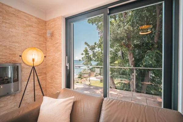 Wohnzimmer  Villa Friede-Marie, App. Ostseeweitblick - mit traumhaften Meerblick