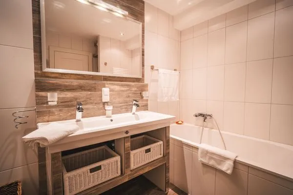 Badezimmer  Villa Friede-Marie, App. Ostseeweitblick - mit traumhaften Meerblick