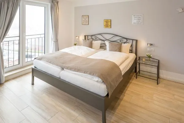 Schlafzimmer  Villa am Kreidebruch, FeWo OstseeWeitblick - Panoramablick auf die Ostsee