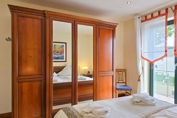 Schlafzimmer  Villa Friede-Marie, Penthouse Lenea - herrlicher Meerblick über die Ostsee
