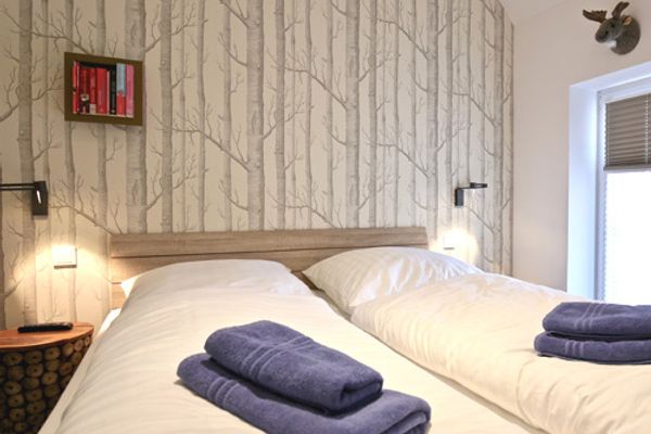 Bootshaus I Ferienwohnung Unter Fischen Wangerooge - Schlafzimmer