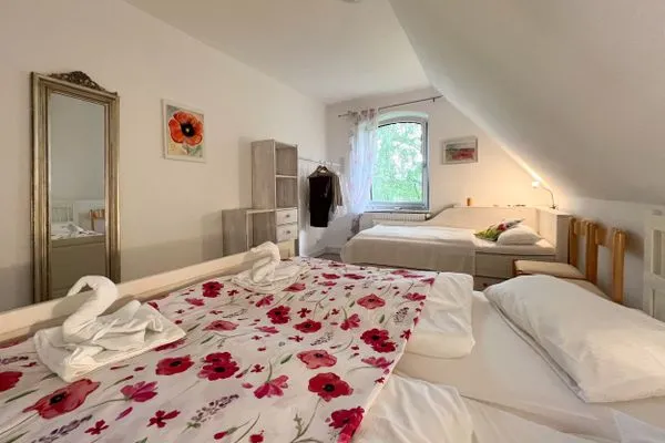 Schlafzimmer  Familienhaus Sonne - mit Gartengrundstück