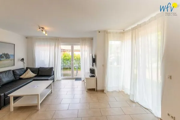 Wohnzimmer Ferienhaus Upholmstraße 105a Röverland